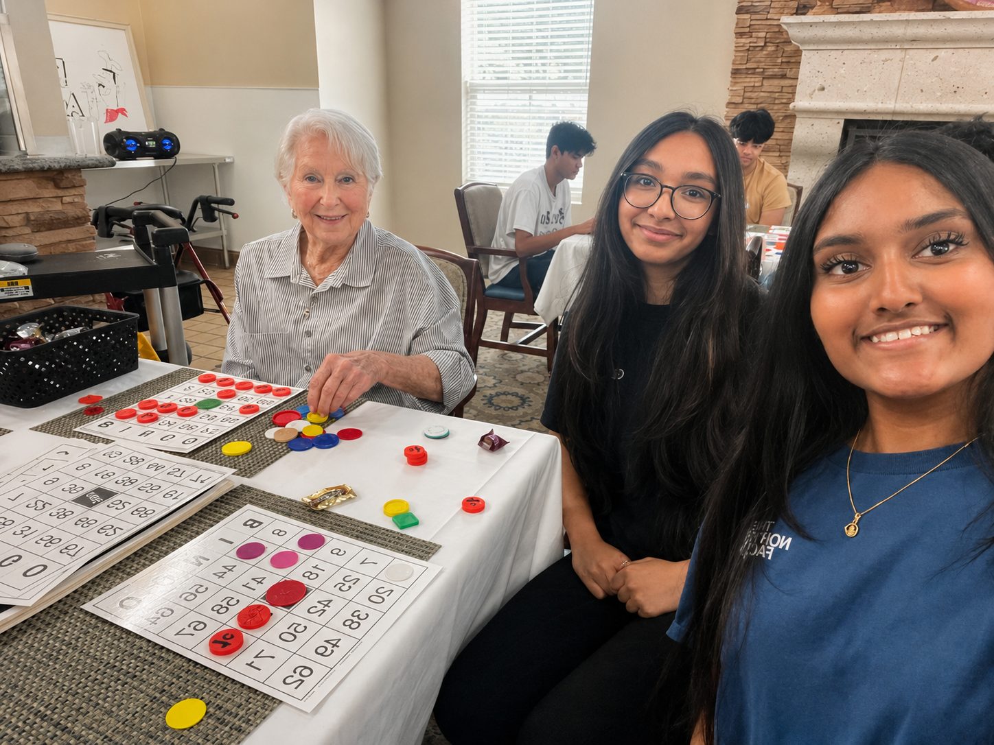 GrandPals volunteers with senior residents